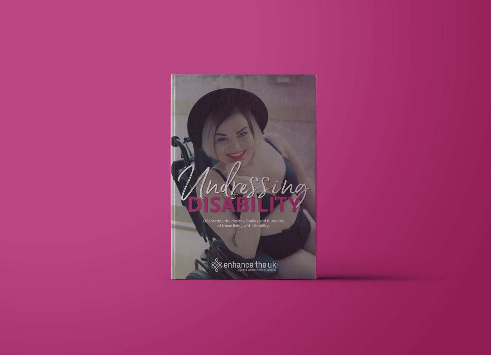 Undressing Disability book cover mock up on a pink background