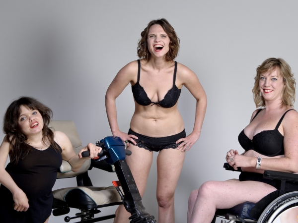 Three woman with various disabilities in their underware
