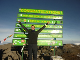 Paul Nicol at the top of Mount Kilimanjaro