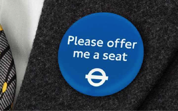 "please offer me a seat" sticker in london underground