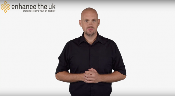 a bald man talking in BSL about the sex and disability campaign