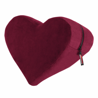 A merlot red coloured heart shaped cushion