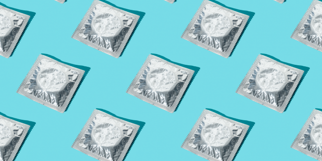 condoms against a blue background