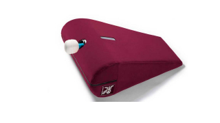 adaptive sex toys - a red wedge shaped piece of furniture with a vibrator on the curved side