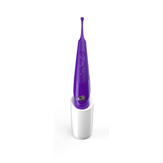 Straight purple vibrator in a charging stand