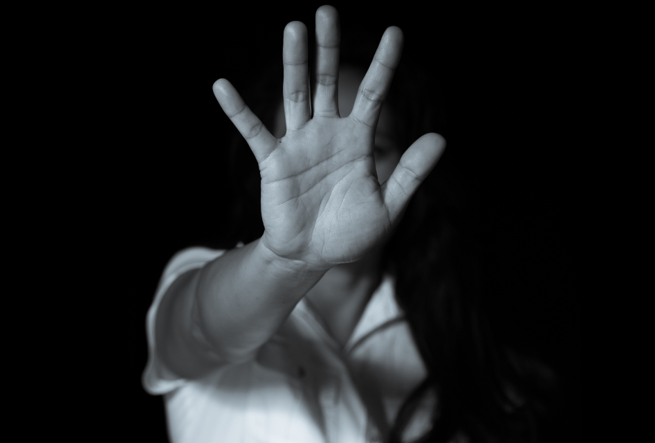 A person holding their palm towards the camera.