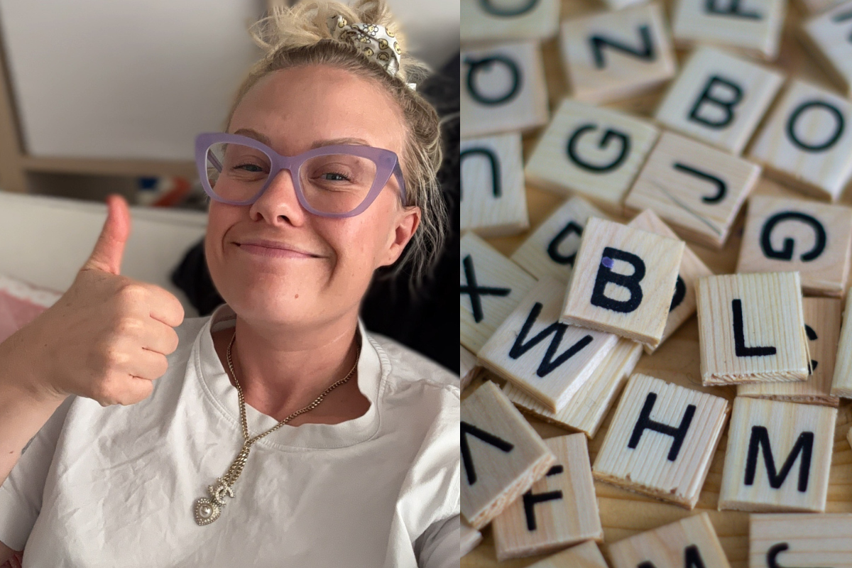 A split image showing a smiling person on the left giving a thumbs up, wearing a white shirt, purple glasses, and a decorative necklace. On the right side, there is a close-up of wooden Scrabble-style letter tiles scattered randomly, with visible letters including B, L, H, M, G, and W.